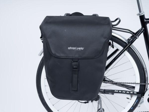 Rear view of COMMUTER Waterproof Triple-X Pannier Bag in black with bag mounted