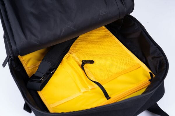 Open main compartment of METRO SIDE Triple-X Bag with laptop sleeve