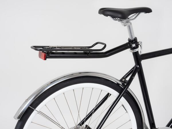 Tour AVS Seatpost Rear Pannier Rack in black mounted on bike