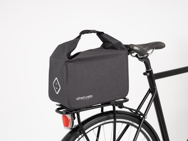 Rear view of TRAVEL Waterproof AVS Top Bag in black with light holder